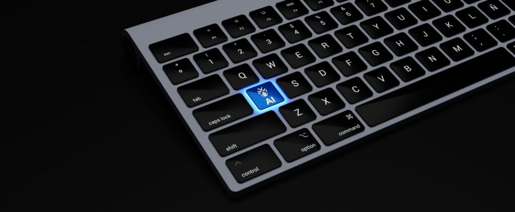 A computer keyboard with a glowing blue key labelled AI and a brain icon, highlighting the concept of artificial intelligence technology.